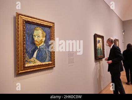 this is the first time the full span of Van Gogh's self-portraiture has been explored in an exhibition and it is the largest group to be brought together in more than 25 years .Alongside 16 self portraits , the exhibition features two major paintings that played an important role in Van Gogh's fashioning of his own image . Van Gogh's chair , described by the artist as symbolic ( self portrait ). and Portrait of Eugene Boch , a portrait of his friend in which van Gogh sought to convey his artistic ideals  . Opens to the public  from  3  February 2022 - 8 May 2022 . Stock Photo