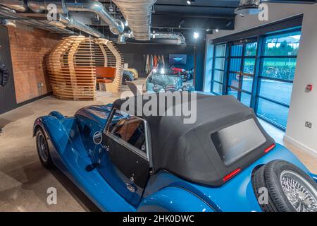 Cars in the showroom of Morgan cars at Malvern Link Worcestershire Stock Photo