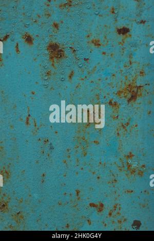 Blue painted sheet metal worn and dirty with rust. Texture background ...