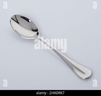 A silver spoon. "Born with a silver spoon in their mouth". Stock Photo
