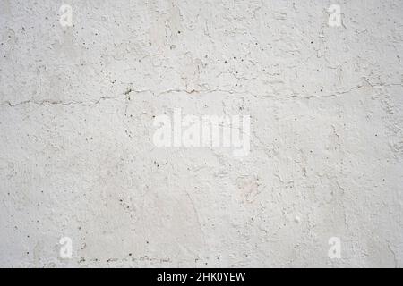 Old distressed traditional white lime-washed wall texture grunge background Stock Photo