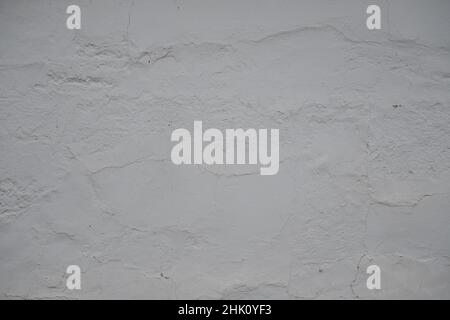Old distressed traditional white lime-washed wall texture grunge background Stock Photo