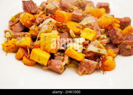 Corned Beef Hash with Sweet Potato and Carrots Stock Photo