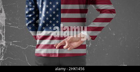 Jacket Flag of America on Businessman with his fingers crossed behind his back Stock Photo