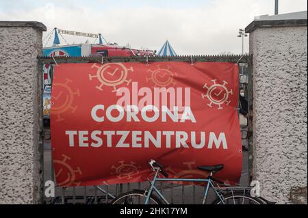 30.01.2022, Berlin, Germany, Europe - A banner hangs in front of a corona test centre for free Covid rapid tests not far from Mauerpark. Stock Photo