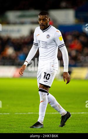 Swansea, UK. 01st Feb, 2022. Olivier Ntcham of Swansea City looks on. EFL Skybet championship match, Swansea city v Luton Town at the Swansea.com Stadium in Swansea on Tuesday 1st February 2022. this image may only be used for Editorial purposes. Editorial use only, license required for commercial use. No use in betting, games or a single club/league/player publications. pic by Lewis Mitchell/Andrew Orchard sports photography/Alamy Live news Credit: Andrew Orchard sports photography/Alamy Live News Stock Photo