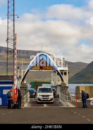 Syðradalur, Denmark - Sep, 2020: Ferry to Klaksvík in the port in the village of Syðradalur on the island of Kalsoy Faroe Islands. Northern Europe Stock Photo