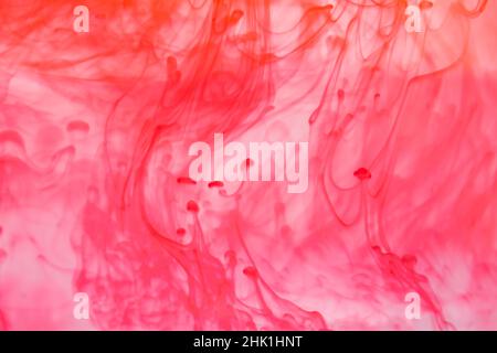 Red ink in the water abstract background. splashes of paint in liquid Stock Photo