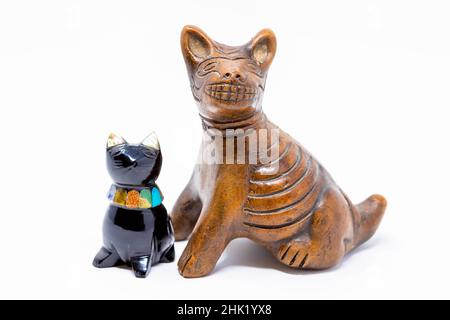 Traditional mexican handcrafted cat and dog statues isolated Stock Photo