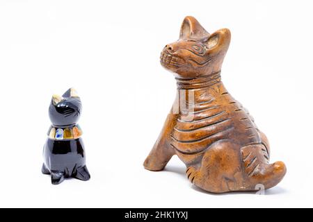 Traditional mexican handcrafted cat and dog statues isolated Stock Photo