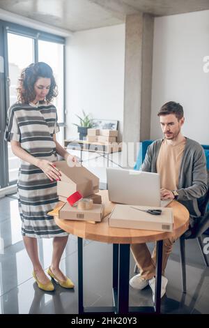 Internet store workers concentrated on their work Stock Photo