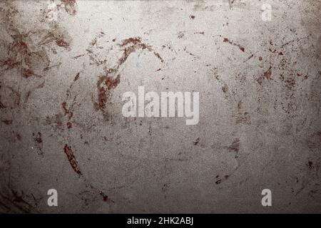 An image of a real aluminum metal surface with numerous scratches, grunge, and rust. Stock Photo