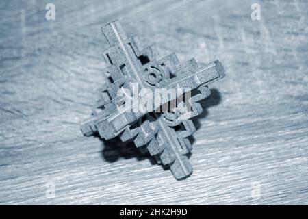 Gray abstract models printed on 3d printer from powder close-up. Stock Photo