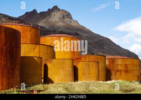 Southern Ocean, South Georgia, King Edward Cove, Grytviken, Grytviken whaling station. Abandoned tanks show the immensity of the whaling done here. Stock Photo