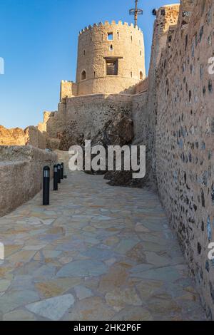 Middle East, Arabian Peninsula, Oman, Muscat, Muttrah. Walkway to Muttrah Fort. Stock Photo