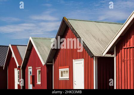 Sweden, Bohuslan, Hamburgsund, red fishing shacks Stock Photo