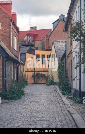 Cobblestoned street in medieval city center of university town Lund Sweden Stock Photo
