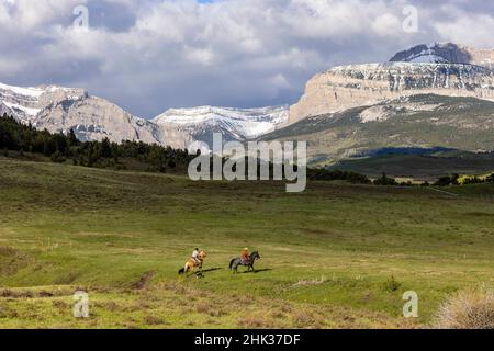 Cowboys ride at the Theodore Roosevelt Memorial Ranch near Dupuyer, Montana, USA (MR) Stock Photo