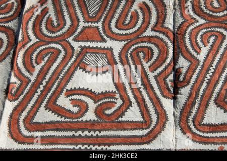 Melanesia, Papua New Guinea, Tufi. Traditional handmade tapa cloth, made from the paper mulberry tree, hand painted with natural dyes using geometric Stock Photo