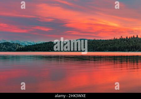 Fiery sunset clouds over Flathead Lake in Dayton, Montana, USA Stock Photo
