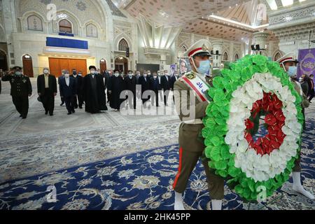 Tehran, Tehran, Iran. 2nd Feb, 2022. A handout picture provided by the Iranian president official website on February 2, 2022, shows Iran's president Ebrahim Raisi praying at the tomb inside the mausoleum of the late founder of the Islamic Republic, Ayatollah Ruhollah Khomeini, in southern Tehran, on the occasion of the 43rd anniversary of Khomeini's return from exile to Iran. Khamenei's predecessor returned to Iran in February 1979 after 14 years in political exile in Iraq and later France, following the revolution that led to the ouster of Iran's ruler at the time, Shah Mohammad Reza Pahl Stock Photo