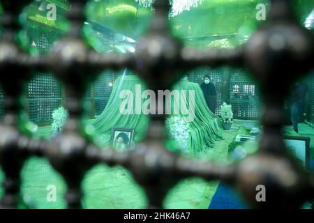 Tehran, Tehran, Iran. 2nd Feb, 2022. A handout picture provided by the Iranian president official website on February 2, 2022, shows Iran's president Ebrahim Raisi praying at the tomb inside the mausoleum of the late founder of the Islamic Republic, Ayatollah Ruhollah Khomeini, in southern Tehran, on the occasion of the 43rd anniversary of Khomeini's return from exile to Iran. Khamenei's predecessor returned to Iran in February 1979 after 14 years in political exile in Iraq and later France, following the revolution that led to the ouster of Iran's ruler at the time, Shah Mohammad Reza Pahl Stock Photo