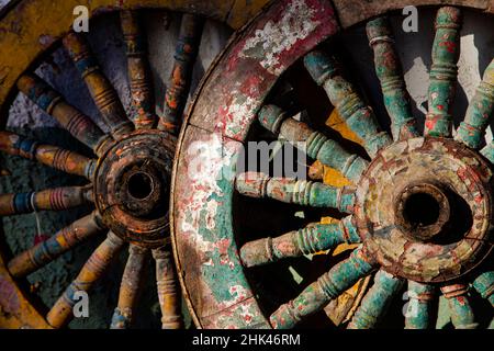 Wagon wheels at antiques store. Stock Photo