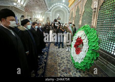 Tehran, Tehran, Iran. 2nd Feb, 2022. A handout picture provided by the Iranian president official website on February 2, 2022, shows Iran's president Ebrahim Raisi praying at the tomb inside the mausoleum of the late founder of the Islamic Republic, Ayatollah Ruhollah Khomeini, in southern Tehran, on the occasion of the 43rd anniversary of Khomeini's return from exile to Iran. Khamenei's predecessor returned to Iran in February 1979 after 14 years in political exile in Iraq and later France, following the revolution that led to the ouster of Iran's ruler at the time, Shah Mohammad Reza Pahl Stock Photo