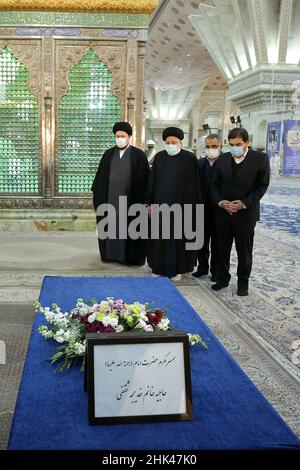 Tehran, Tehran, Iran. 2nd Feb, 2022. A handout picture provided by the Iranian president official website on February 2, 2022, shows Iran's president Ebrahim Raisi praying at the tomb inside the mausoleum of the late founder of the Islamic Republic, Ayatollah Ruhollah Khomeini, in southern Tehran, on the occasion of the 43rd anniversary of Khomeini's return from exile to Iran. Khamenei's predecessor returned to Iran in February 1979 after 14 years in political exile in Iraq and later France, following the revolution that led to the ouster of Iran's ruler at the time, Shah Mohammad Reza Pahl Stock Photo