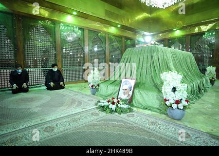 Tehran, Tehran, Iran. 2nd Feb, 2022. A handout picture provided by the Iranian president official website on February 2, 2022, shows Iran's president Ebrahim Raisi praying at the tomb inside the mausoleum of the late founder of the Islamic Republic, Ayatollah Ruhollah Khomeini, in southern Tehran, on the occasion of the 43rd anniversary of Khomeini's return from exile to Iran. Khamenei's predecessor returned to Iran in February 1979 after 14 years in political exile in Iraq and later France, following the revolution that led to the ouster of Iran's ruler at the time, Shah Mohammad Reza Pahl Stock Photo