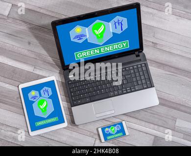 Green energy concept shown on different information technology devices Stock Photo