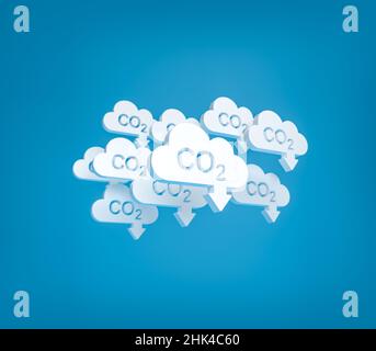 CO2 reduction concept. Cloud shaped objects with the word CO2 punched out and an arrow pointing down in front of a blue background. Plenty of copy spa Stock Photo