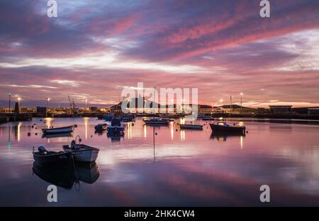 Ballycotton, Cork, Ireland. 02nd February, 2022. Small boats moored in the harbour at dawn on a calm spring morning at Ballycotton, Co. Cork, Ireland. - Credit; David Creedon / Alamy Live News Stock Photo