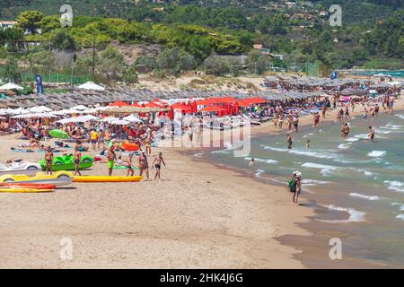 Zakynthos, Greece - August 15, 2016: Tourists are at Banana Beach. One of the most popular resort place of Greek island Zakynthos. Coast of the Ionian Stock Photo