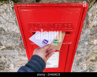 Torquay, UK. 02nd Feb, 2022. Posting two letters with the new QR Code Stamps from the Royal Mail, released 2nd Feb 2022 in the UK. Credit: Thomas Faull/Alamy Live News Stock Photo