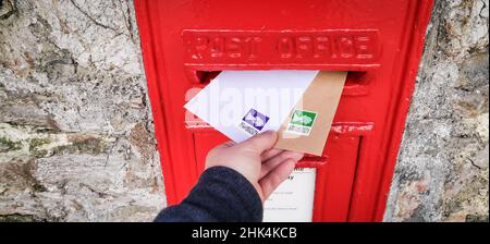 Torquay, UK. 02nd Feb, 2022. Posting two letters with the new QR Code Stamps from the Royal Mail, released 2nd Feb 2022 in the UK. Credit: Thomas Faull/Alamy Live News Stock Photo