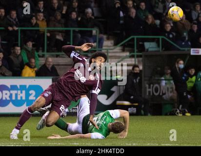 Edinburgh, UK. 28th Jan, 2022. Cinch Premiership - Hibernian v Heart of Midlothian 28/1/2022. Hibernian play host to Hearts in the cinch Premiership at Easter Road Stadium, Edinburgh, Midlothian, UK. Pic shows: HeartsÕ striker, Ellis Simms, and HibsÕ centre-back, Ryan Porteous, clash. Credit: Ian Jacobs/Alamy Live News Stock Photo