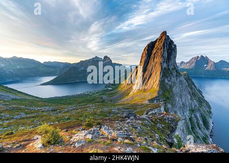 Sunrise over the clear water of the fjord and Segla mountain, Senja island, Troms county, Norway, Scandinavia, Europe Stock Photo