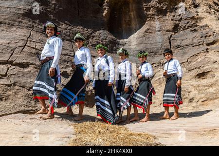 Young man and boys of the Qahtani flower tribe, Asir Mountains, Kingdom of Saudi Arabia, Middle East Stock Photo