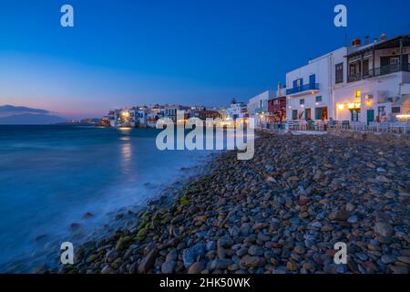 View of restaurants and pebble beach at Little Venice in Mykonos Town at night, Mykonos, Cyclades Islands, Greek Islands, Aegean Sea, Greece, Europe Stock Photo