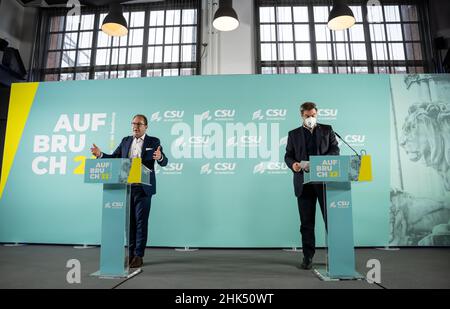 Berlin, Germany, 02 February 2022,  Alexander Dobrindt (l, CSU), chairman of the CSU state group in the CDU/CSU parliamentary party, and Markus Söder, Minister-President of Bavaria and chairman of the CSU, make their comments at the closed-door meeting of the CSU state group of the German Bundestag. The traditional winter retreat was supposed to take place at the beginning of January, but had to be postponed due to several corona illnesses. With the meeting, the state group regularly takes stock of the situation and looks ahead to the political year. Due to the pandemic, the meeting is being  Stock Photo