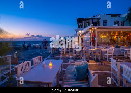 View of restaurants at Little Venice in Mykonos Town at night, Mykonos, Cyclades Islands, Greek Islands, Aegean Sea, Greece, Europe Stock Photo