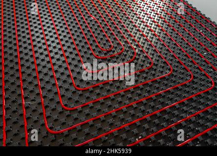 fllor heating pipes in the house under construction with light Stock Photo