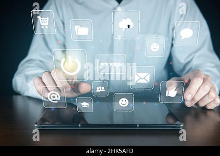 Business man touching turn on icon. Social network concept. Email icon and internet technology netwo Stock Photo