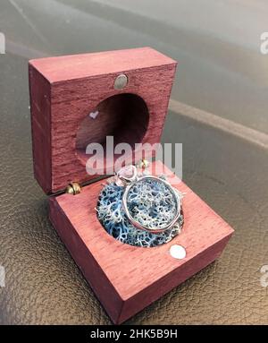 wedding golden ring with diamond in  gift box. indoor closeup Stock Photo