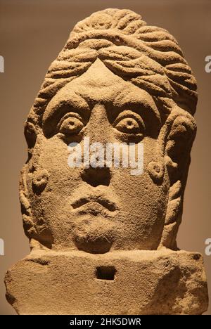 This unusual limestone head, dating from the short Romon0-British period, was found in Towcester - hence its name. It's famous for its striking, shock Stock Photo
