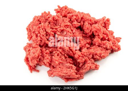 Beef mince meat isolated on white, raw minced meat in close-up in top view Stock Photo