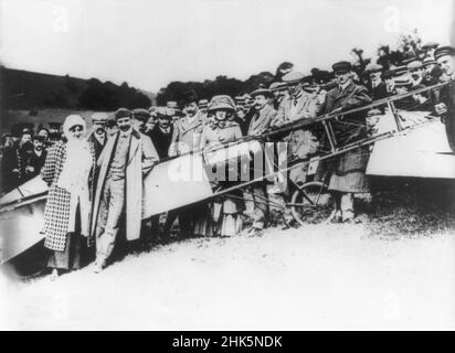 Vintage photo dated July 25th 1909 in Dover England of the French aviation pioneer Louis Bleriot with his wife posing next to his Bleriot Type XI monoplane after the first crossing of the English Channel from Calais to Dover Stock Photo