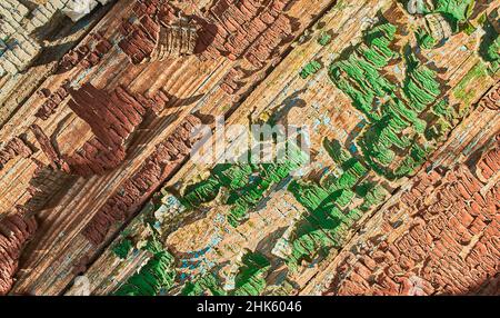 Grunge wall colored green background texture in rainbow style. Stock Photo