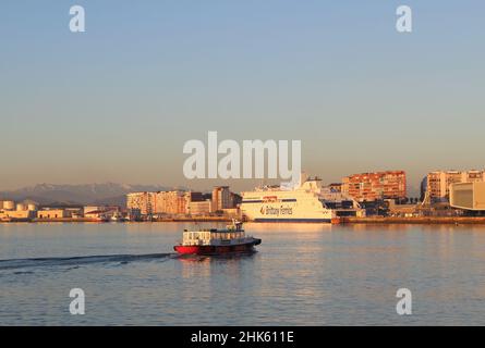 A Regina Ferry boat arriving in the bay of Santander Cantabria Spain with the Salamanca Brittany Ferries ship Stone Crane and Botin Arts Centre Stock Photo